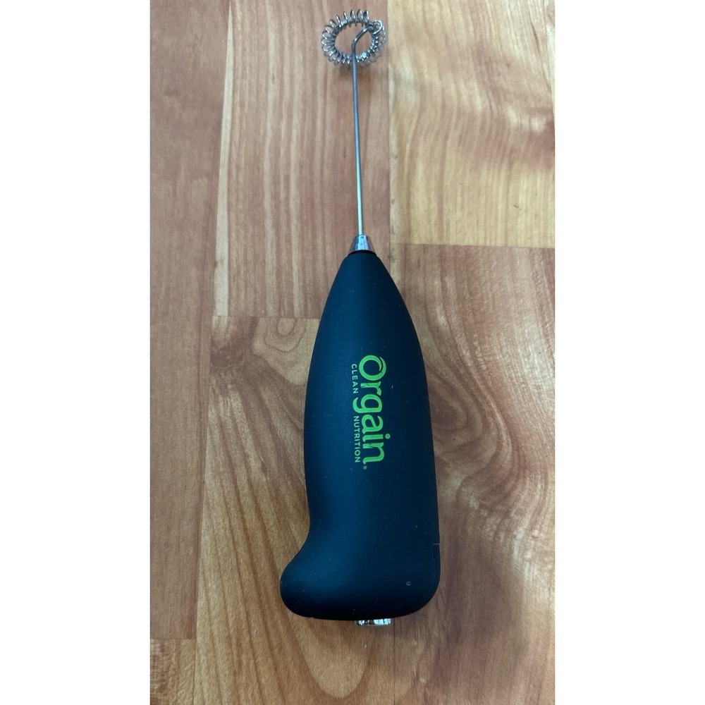 Orgain branded handheld electric mixer designed for mixing drinks